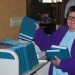 Cindy with Hymnals thumbnail